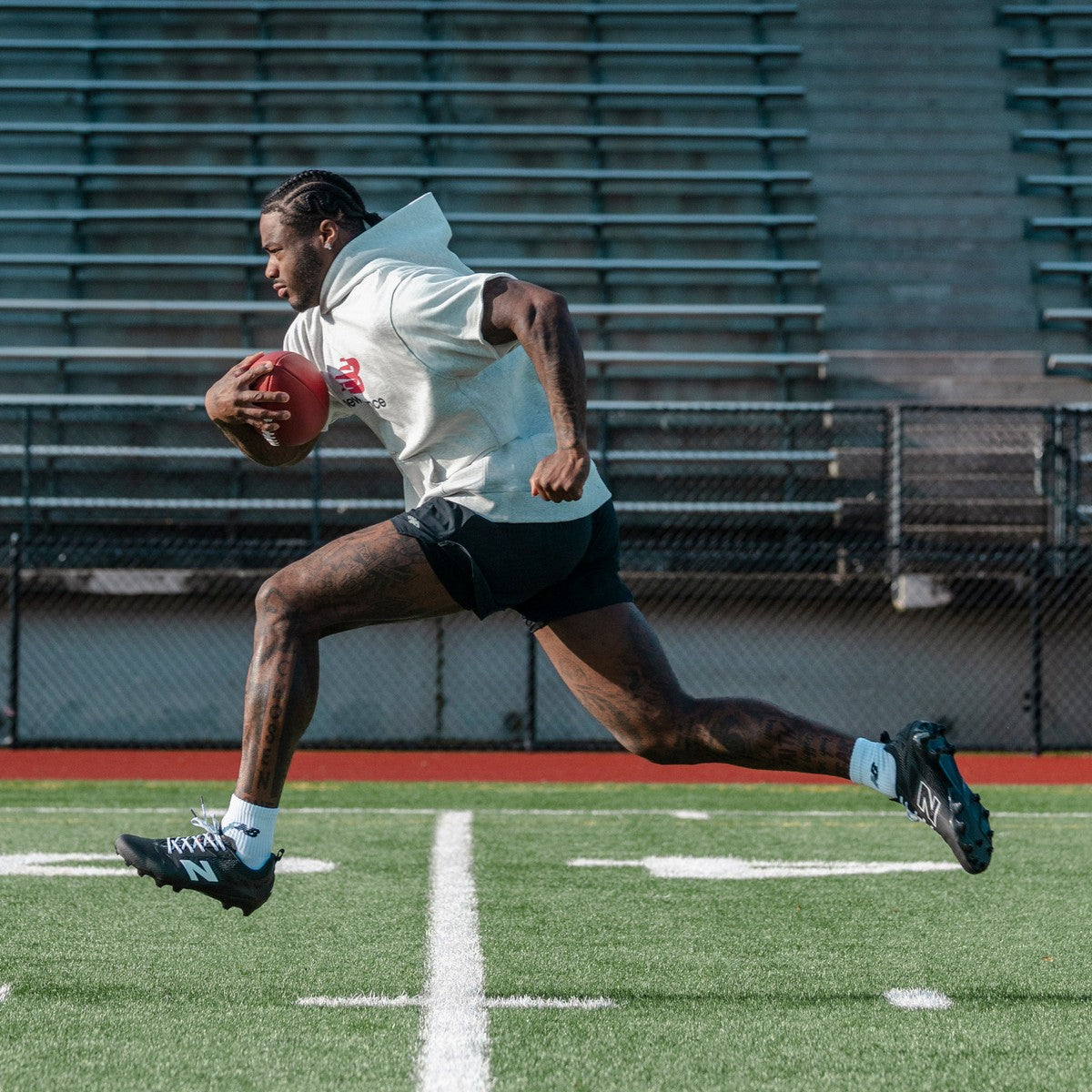 New Balance Rev IQ Football Cleats